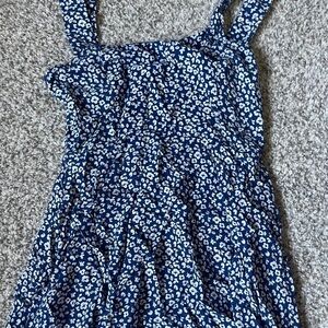 this is a blue flower dress in women’s xs